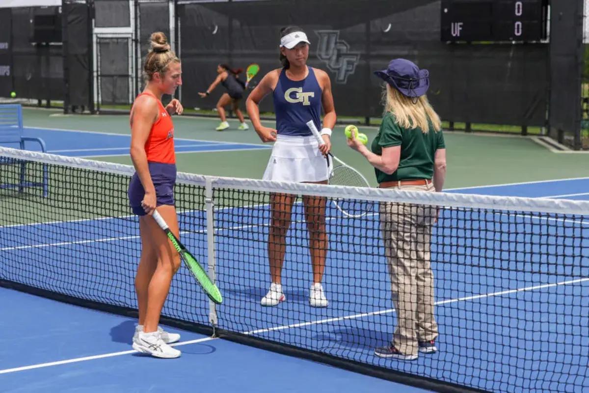 Junior Carol Lee discusses with official during her Round of 16 matchup against Auburn's Carolyn Ansari